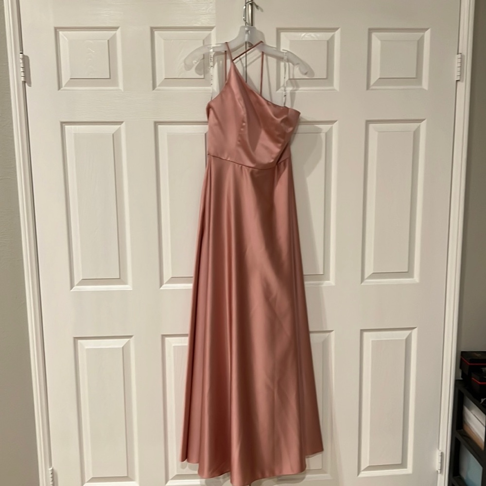 Never worn. Bridesmaid dress could be used for a formal event. Davids Bridal Sz8